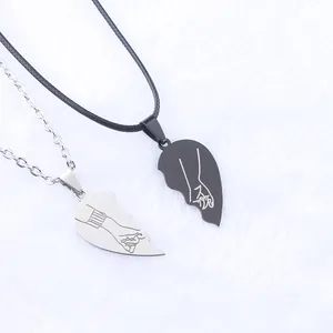 Collana coppia cuore puzzle in acciaio inossidabile con incisione mani intrecciate