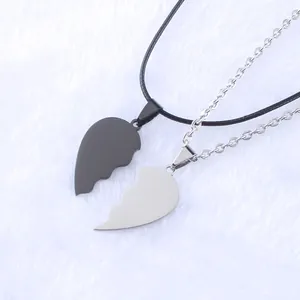 Collane con ciondolo a cuore puzzle in acciaio nero e argento per coppia