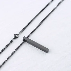 Macro detail of minimalist black rectangular bar pendant with solid matte metal finish