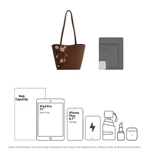 Brown pebbled leather tote bag showing large capacity for tablet and daily items