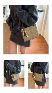 Detailed views of army green plaid crossbody bag with brown leather accents and retro beads