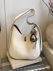 Sac Seau Hobo en Cuir PU Vintage pour Femmes Sac à Épaule Bandoulière Grande Capacité Avec Pendentif Coeur Léopard