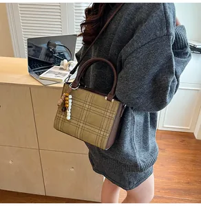 British style khaki plaid handbag with vintage beaded charm and brown leather handles