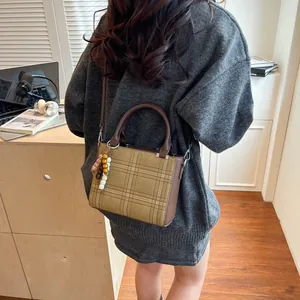 Minimalist plaid crossbody square bag with wooden bead pendant and brown shoulder strap