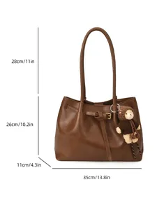 Minimalist vintage dark brown tote bag in glossy faux leather with bear charm and dimensions