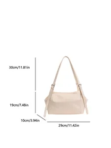 Sac fourre-tout minimaliste en cuir crème avec dimensions affichées sur fond blanc neutre