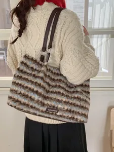 Striped plush tote bag with leather straps and wave pattern for winter fashion