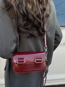 Chic minimalist wine red glossy patent leather baguette bag for women with silver hardware