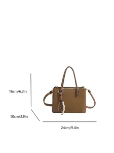 Brown textured corduroy handbag for women with dimensions 24cm width and 16cm height