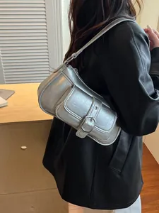 Sleek silver metallic baguette shoulder bag with crackle texture for women's Y2K style