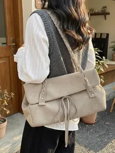 Borsa tote minimalista in pelle scamosciata beige con spalline intrecciate e fiocco donna