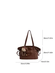 Vintage large capacity brown tote bag with plush bear charm and size measurements
