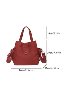 Sac seau léger en nylon rouge foncé avec bandoulière amovible et dimensions précises