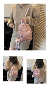 Rosa Mini-Rucksack aus Kunstleder mit strukturierter Hülle und Plüschkatzen-Detail