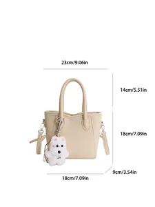 Sac seau beige avec breloque chiot et dimensions précises indiquées en cm et pouces