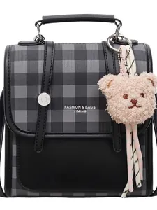 Elegant plaid tote bag with faux leather finish and a cute pink plush bear pendant