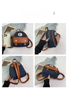 Detail views of mini denim backpack with brown PU leather trim and cute bear badge