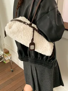 Chic cream faux fur tote bag with brown leather straps and silver buckles for women