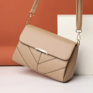 Khaki PU leather flap bag with V-shaped stitching and silver metal bar buckle