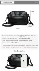 Crossbody phone bag detail showing 22x15x2cm dimensions and size comparison with smartphone