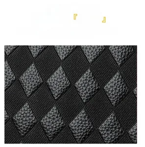 Detailed view of waterproof and scratch-resistant black litchi grain leather fabric