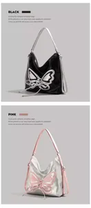 Close-up of black and pink butterfly shoulder bags showing metallic finish and embroidery