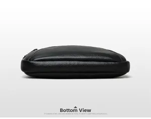 Detail view of the pebbled leather bottom on this black fashion crossbody phone bag