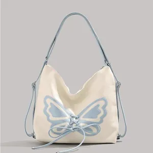 White butterfly backpack versatile shoulder bag for women with blue bow knot detail