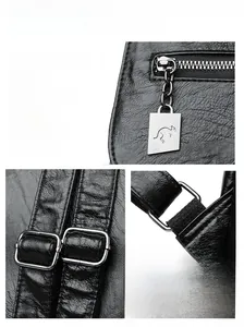 Detail of silver hardware and litchi texture on black leather fashion backpack