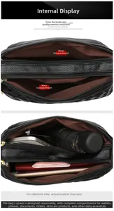 Detail view of large capacity crossbody bag with dual main compartments and leather texture