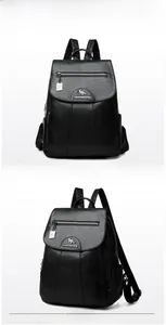 Detailed views of a black PU leather backpack with silver zippers and kangaroo metal logo