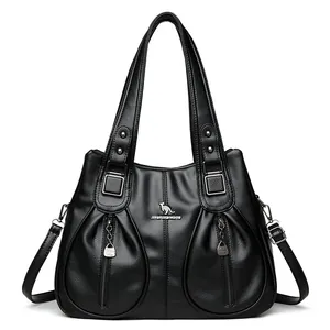 Elegant black lychee textured tote bag with double handles and long shoulder strap
