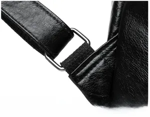 Macro detail of high-quality black leather texture with durable silver metal strap buckle