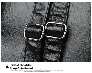Detail of adjustable metal buckle on black litchi pattern leather backpack strap
