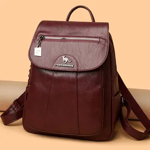 Burgundy faux leather backpack for women with silver zippers and kangaroo logo details
