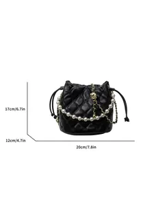 Black quilted bucket bag with pearl handle and golden chain, size 20x17x12 cm