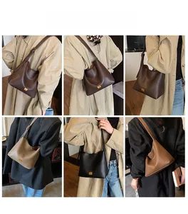 Détails du sac seau minimaliste en quatre couleurs montrant la texture du cuir et la boucle
