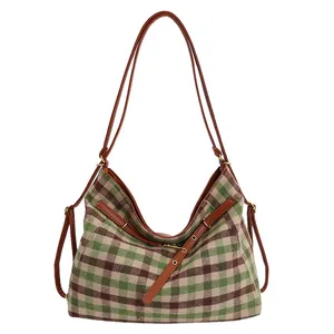 Retro vintage plaid canvas tote bag in green-brown checks with adjustable leather strap