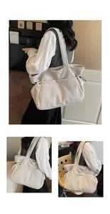Detail of off-white corduroy tote bag showing high-density texture and drawstring side