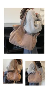 Detailed texture of the corduroy tote bag showing vertical ribs and drawstring side detail