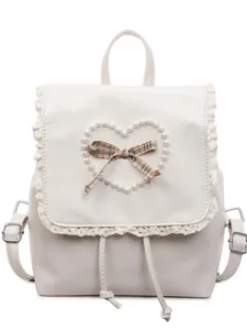 Chic beige PU leather backpack featuring lace edges and a pearl heart with a plaid bow