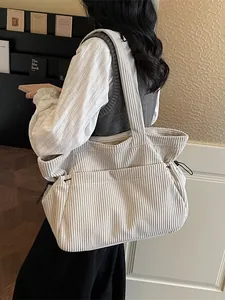 Chic cream corduroy tote bag for women featuring large capacity and side drawstring details