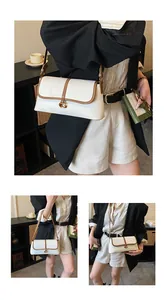 Détail du cuir grainé beige et de la boucle dorée en G sur ce sac baguette chic