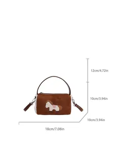 Brown faux fur baguette bag with cartoon pony embroidery and leather strap handles