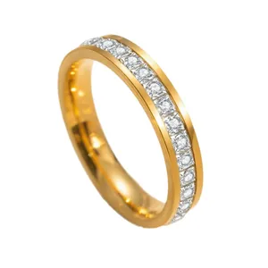 Elegant gold titanium steel ring featuring a full circle of channel-set sparkling crystals
