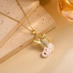 Detail of Christmas stocking pendant necklace with gold chain and sparkling crystals