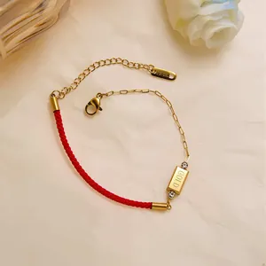 Asymmetric red rope and gold chain bracelet with GOLD bar and sparkling crystals