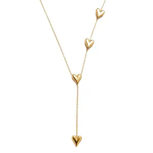 Elegant gold heart Y-necklace for women with polished heart-shaped pendants on fine chain