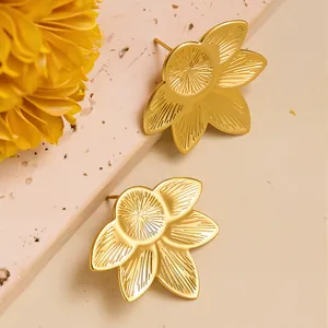 Elegant gold leaf flower titanium steel stud earrings with luxury brushed metal texture