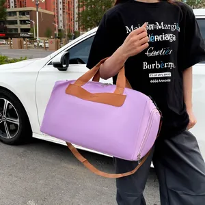 Detail view of a lavender travel bag with a dedicated wet and dry separation compartment